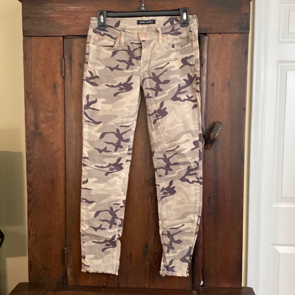 Cute pair of camo Angry Rabbit pants with frayed hem.